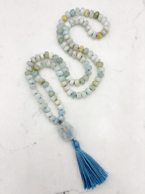 aquamarine gemstone mala necklace with aquamarine guru bead and blue tassel | radiant malas | handmade in boulder, colorado