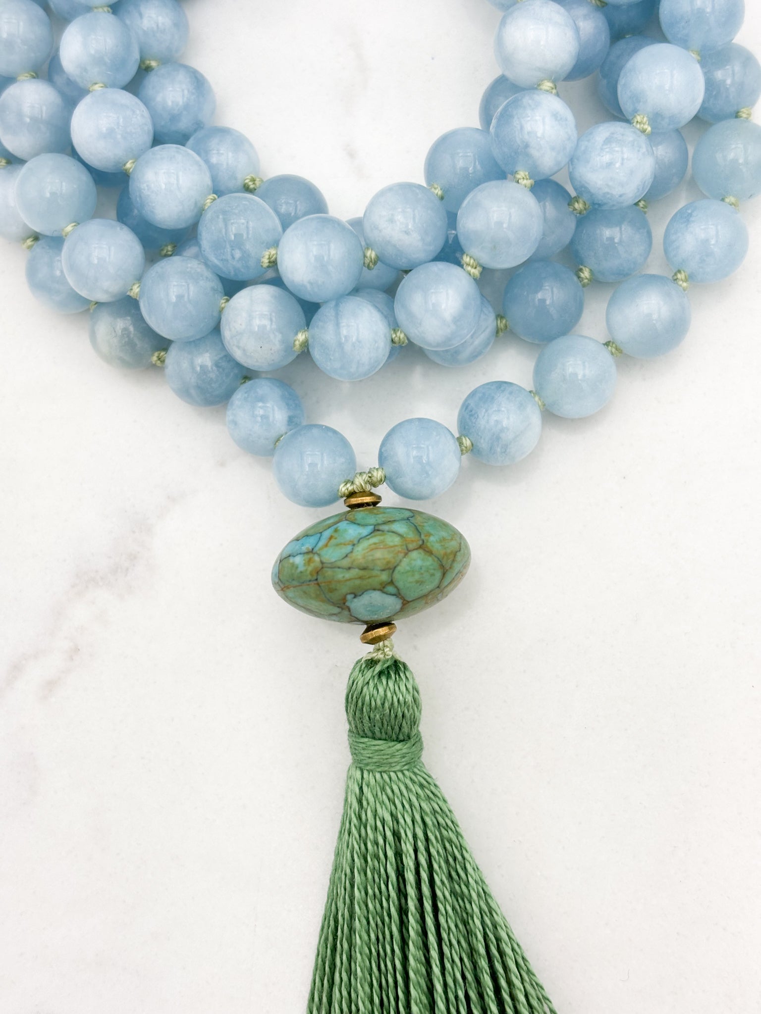 aquamarine gemstone mala with turquoise guru bead and green tassel | radiant malas | handmade in boulder, colorado