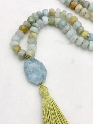 aquamarine gemstone mala necklace with aquamarine guru bead and green tassel | radiant malas | handmade in boulder, colorado