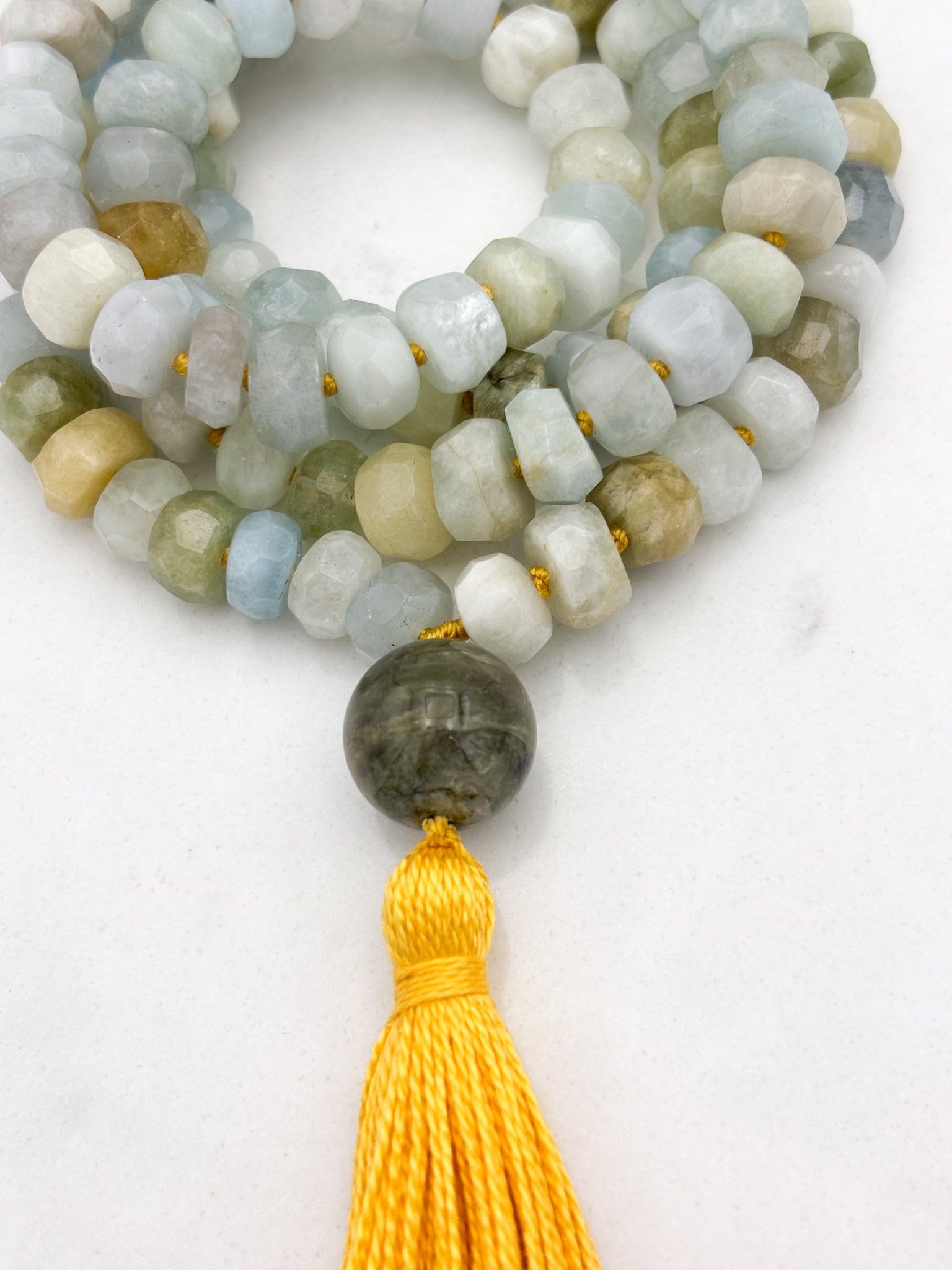 aquamarine gemstone mala necklace with cat's eye tourmaline guru bead and yellow tassel | radiant malas | handmade in boulder, colorado