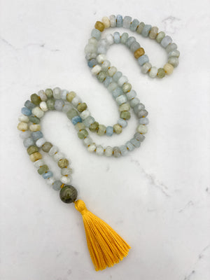 aquamarine gemstone mala necklace with cat's eye tourmaline guru bead and yellow tassel | radiant malas | handmade in boulder, colorado