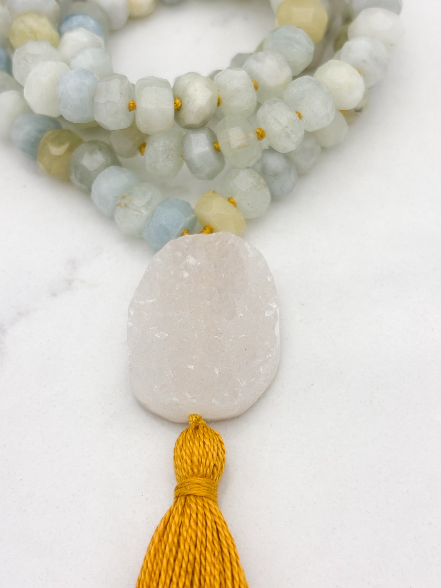 aquamarine gemstone mala necklace with druzy quartz guru bead and gold tassel | radiant malas | handmade in boulder, colorado