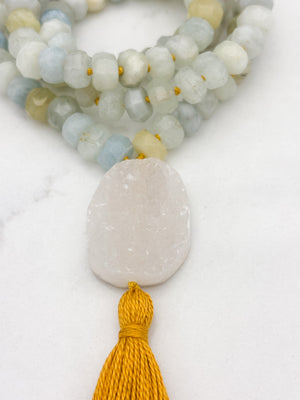 aquamarine gemstone mala necklace with druzy quartz guru bead and gold tassel | radiant malas | handmade in boulder, colorado