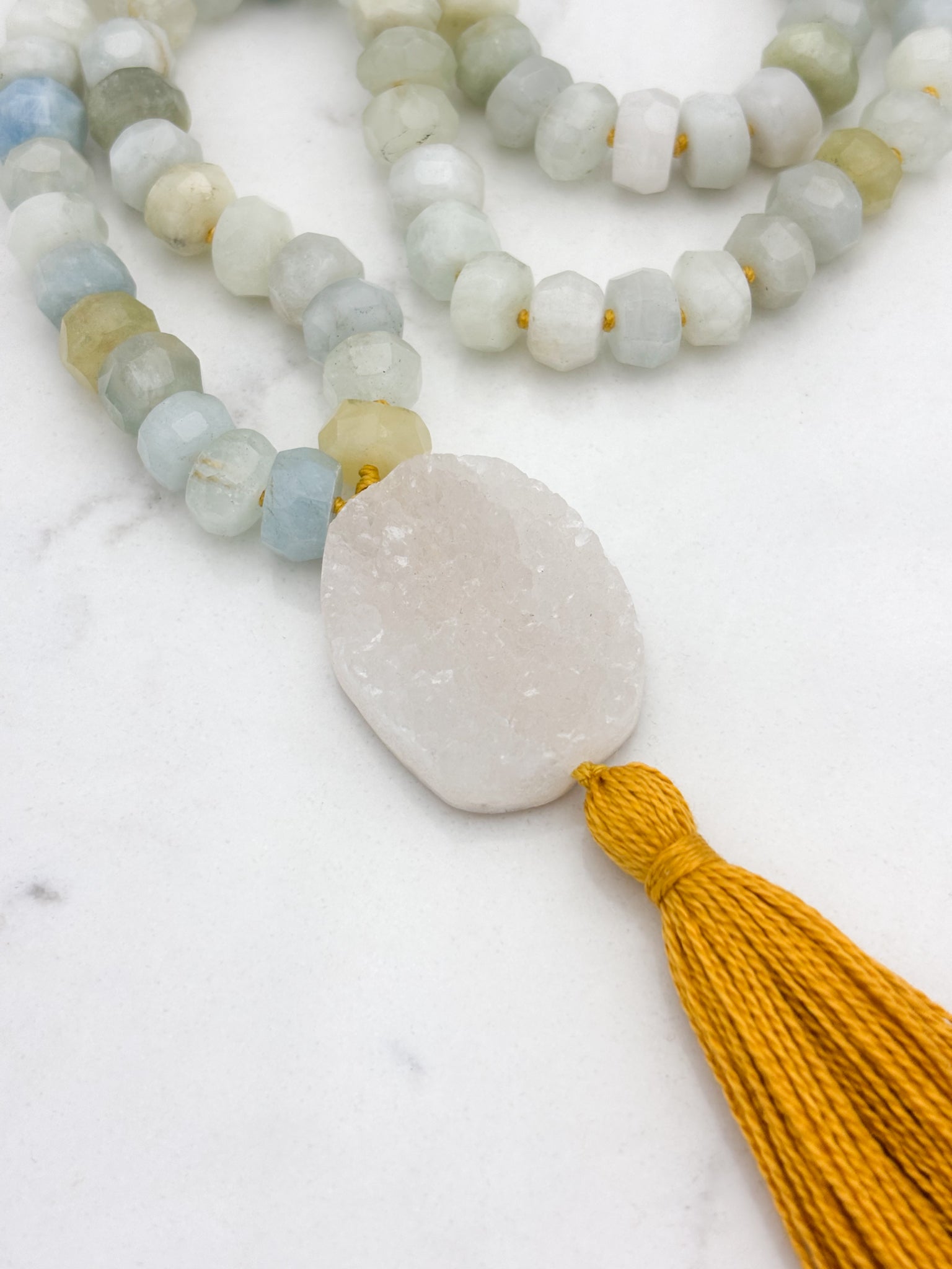 aquamarine gemstone mala necklace with druzy quartz guru bead and gold tassel | radiant malas | handmade in boulder, colorado