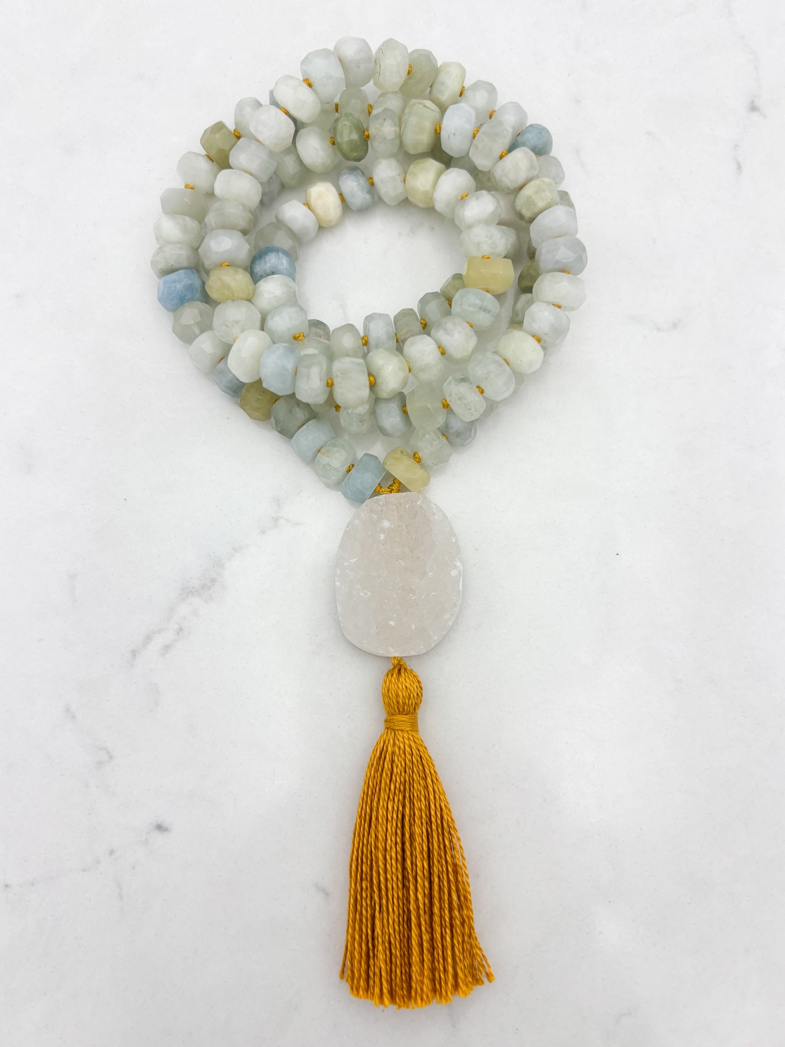 aquamarine gemstone mala necklace with druzy quartz guru bead and gold tassel | radiant malas | handmade in boulder, colorado