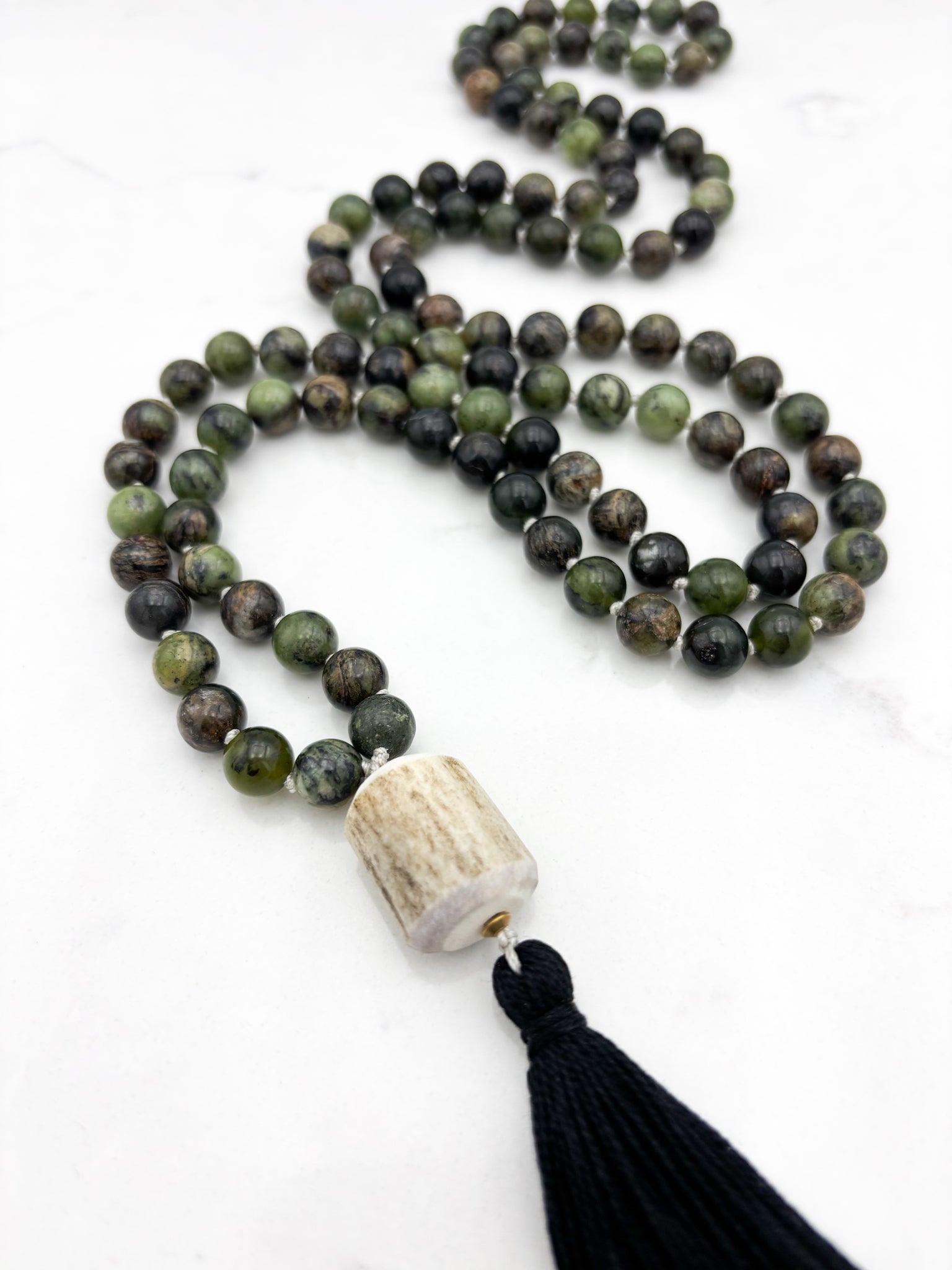 australian jade gemstone mala necklace  with elk antler guru bead and black tassel | radiant malas | handmade in boulder, colorado
