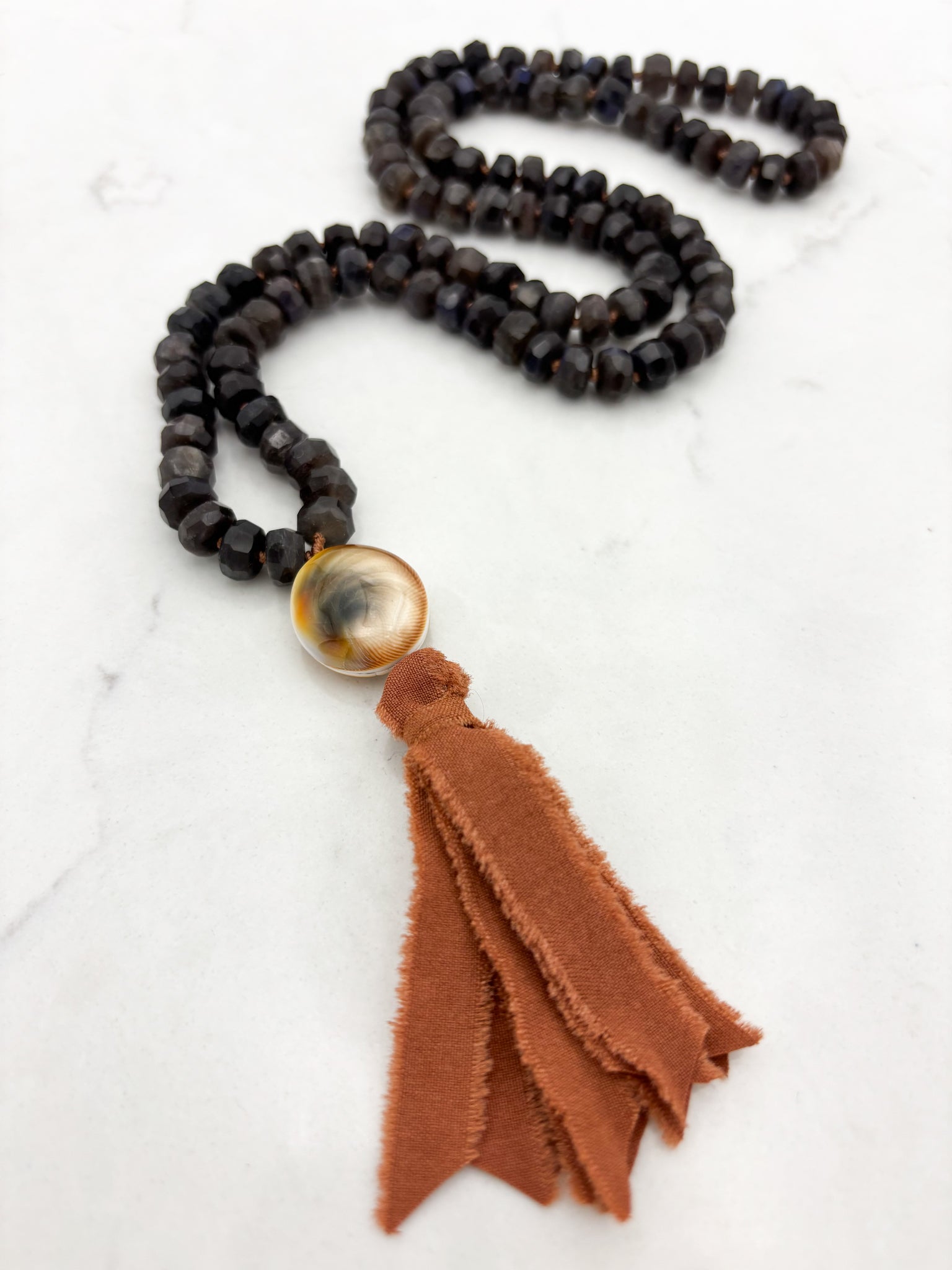 black labradorite gemstone mala with shell guru bead and silk tassel | radiant malas | handmade in boulder, colorado