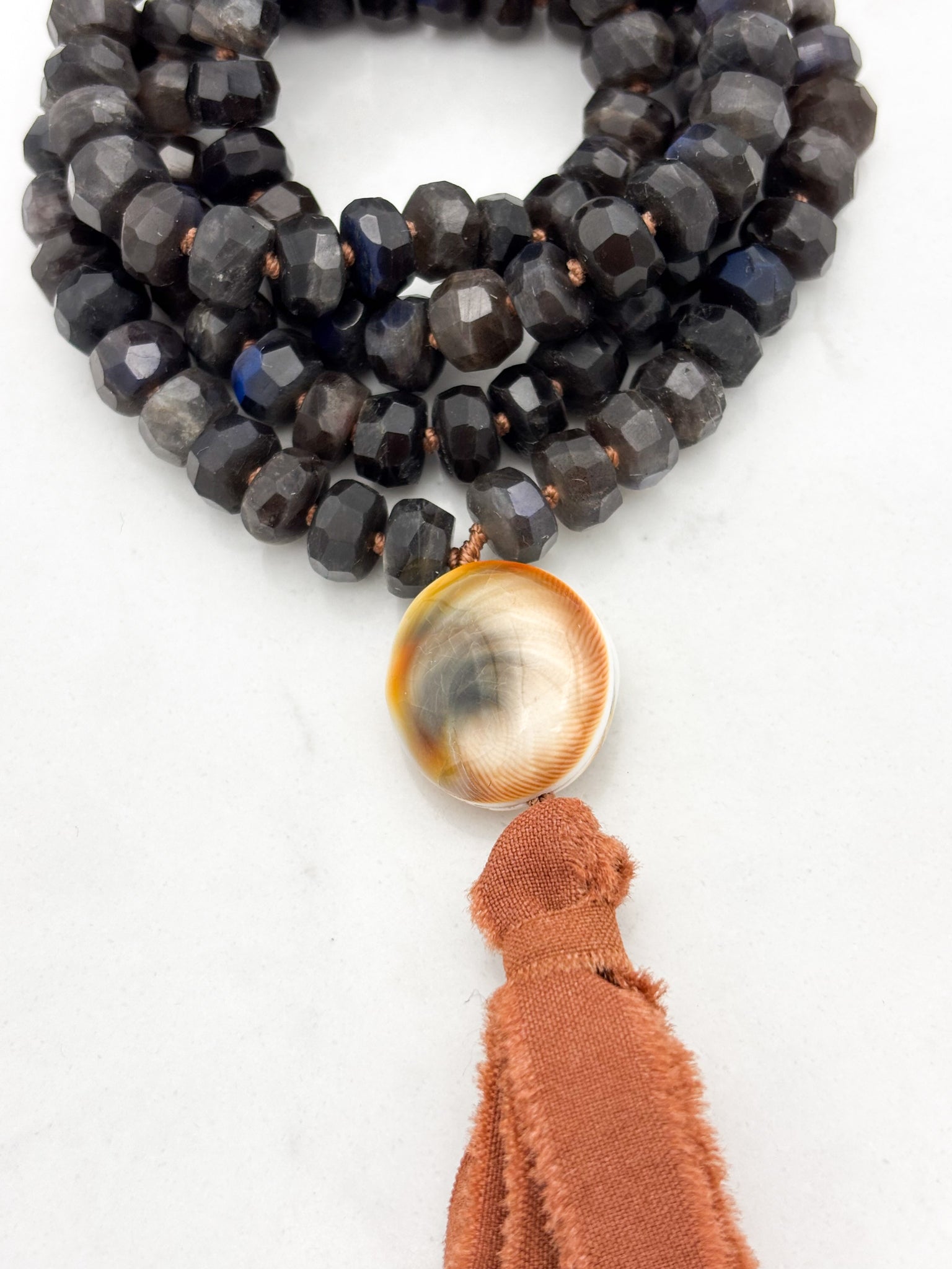 black labradorite gemstone mala with shell guru bead and silk tassel | radiant malas | handmade in boulder, colorado