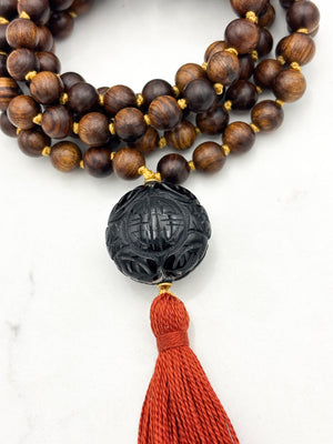 black rosewood mala necklace with onyx guru bead and ruse tassel | radiant Malas | handmade in boulder, colorado