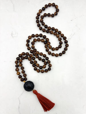 black rosewood mala necklace with onyx guru bead and ruse tassel | radiant Malas | handmade in boulder, colorado