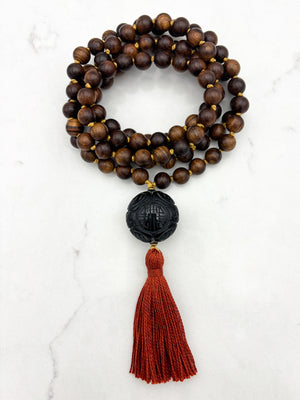 black rosewood mala necklace with onyx guru bead and ruse tassel | radiant Malas | handmade in boulder, colorado