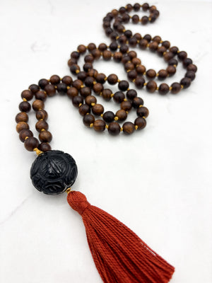 black rosewood mala necklace with onyx guru bead and ruse tassel | radiant Malas | handmade in boulder, colorado
