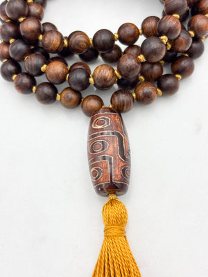 black rosewood mala with dzi agate guru bead and gold tassel  | radiant Malas | handmade in boulder, colorado