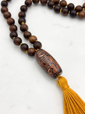 black rosewood mala with dzi agate guru bead and gold tassel  | radiant Malas | handmade in boulder, colorado