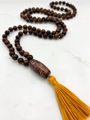 black rosewood mala with dzi agate guru bead and gold tassel  | radiant Malas | handmade in boulder, colorado