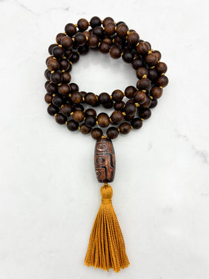 black rosewood mala with dzi agate guru bead and gold tassel  | radiant Malas | handmade in boulder, colorado