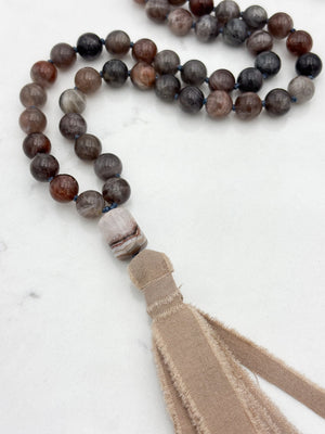 black sunstone gemstone mala necklace with rainbow amethyst guru bead and tan silk tassel |  radiant malas | handmade in boulder, colorado
