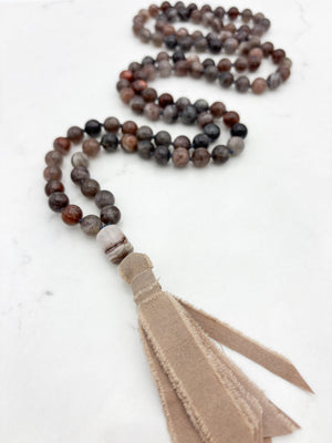 black sunstone gemstone mala necklace with rainbow amethyst guru bead and tan silk tassel |  radiant malas | handmade in boulder, colorado