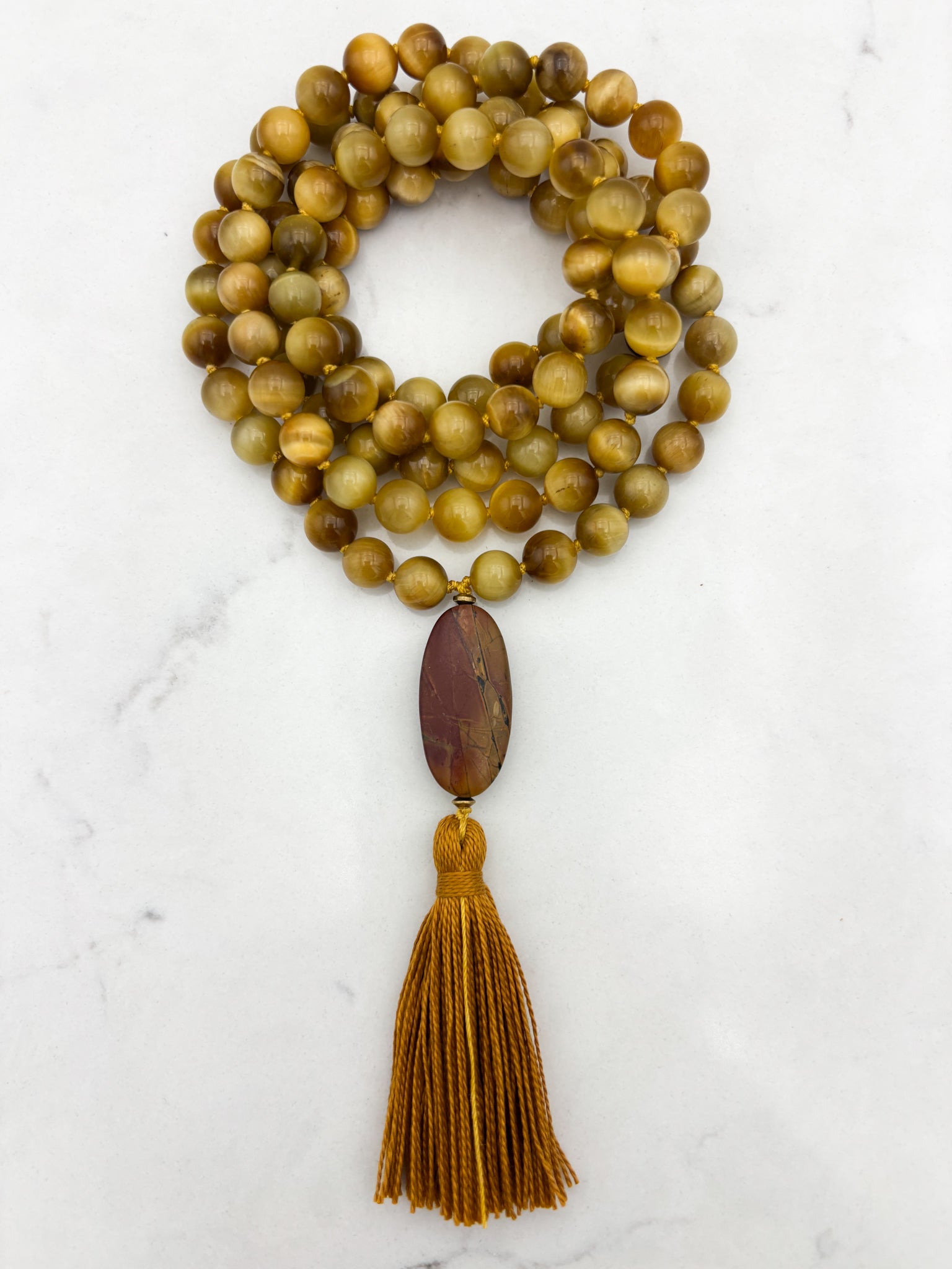 blond tiger's eye gemstone mala with jasper guru bead and gold tassel necklace | radiant malas | handmade in boulder, colorado