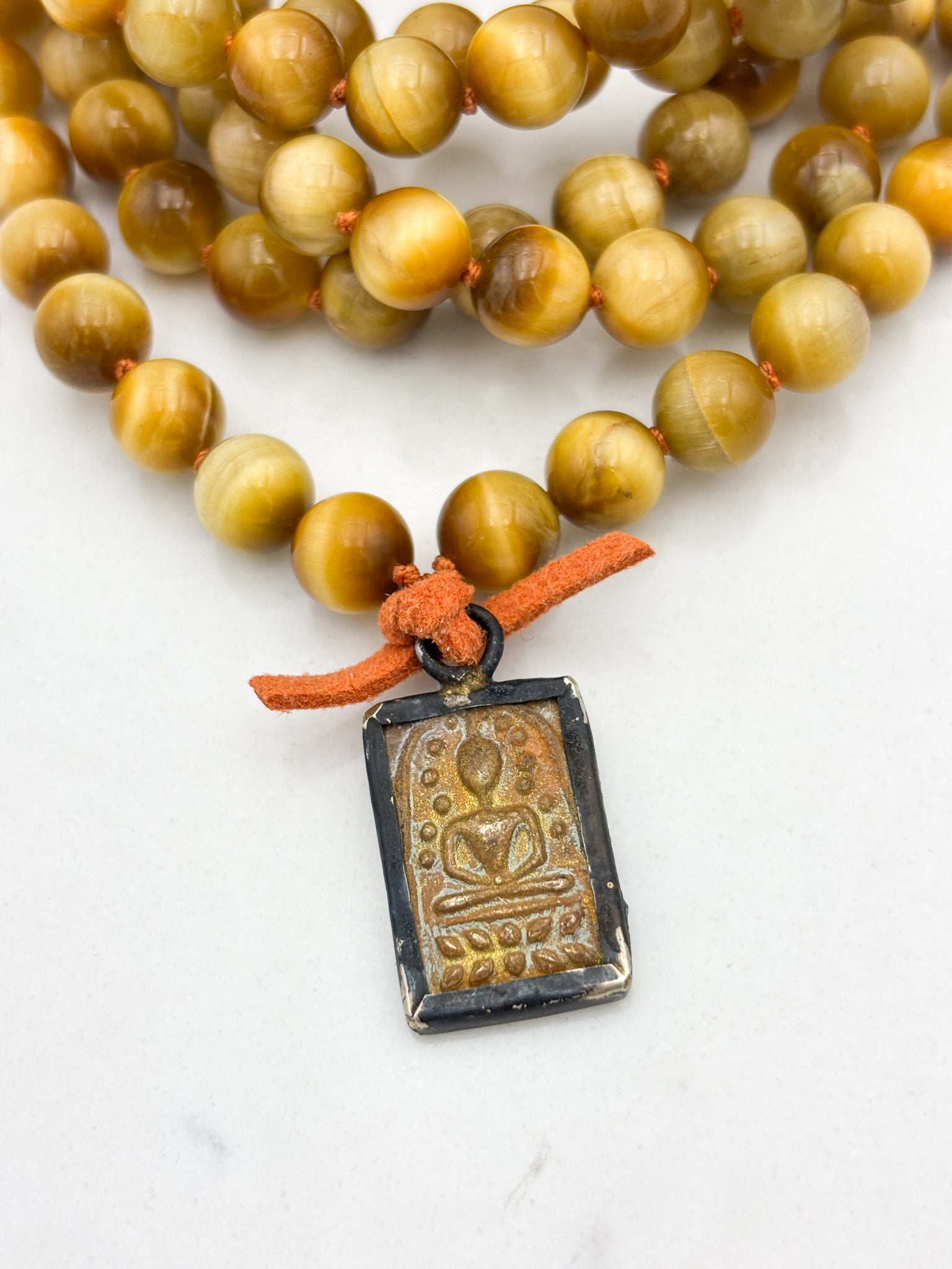 blond tiger's eye gemstone mala necklace with vintage brass pendant | radiant malas | handmade in boulder, colorado