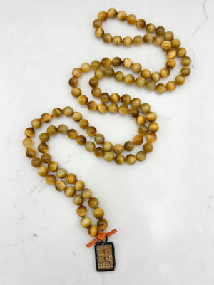 blond tiger's eye gemstone mala necklace with vintage brass pendant | radiant malas | handmade in boulder, colorado