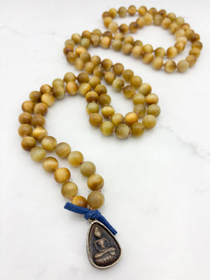 blond tiger's eye gemstone mala necklace with vintage brass pendant | radiant malas | handmade in boulder, colorado
