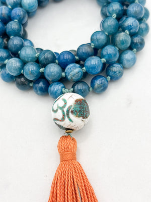 blue apatite gemstone mala with bone turquoise coral guru bead and orange | radiant malas | handmade in boulder, colorado