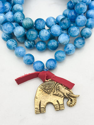 blue apatite gemstone mala with brass elephant pendant | radiant malas | handmade in boulder, colorado