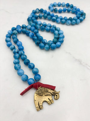 blue apatite gemstone mala with brass elephant pendant | radiant malas | handmade in boulder, colorado