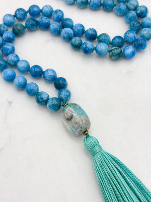 blue apatite gemstone mala with ceramic guru bead and teal tassel | radiant malas | handmade in boulder, colorado