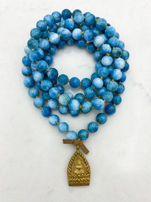 blue apatite gemstone mala with brass buddha pendant | radiant malas | handmade in boulder, colorado