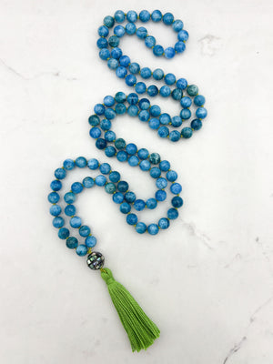 blue apatite gemstone mala with mosaic abalone shell guru bead and green tassel | radiant malas | handmade in boulder, colorado