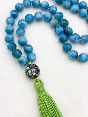 blue apatite gemstone mala with mosaic abalone shell guru bead and green tassel | radiant malas | handmade in boulder, colorado