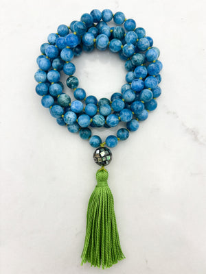 blue apatite gemstone mala with mosaic abalone shell guru bead and green tassel | radiant malas | handmade in boulder, colorado