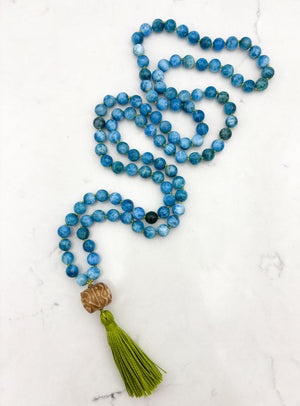 Blue Apatite gemstone mala with carved bone guru bead and green tassel | radiant malas | handmade in boulder, colorado