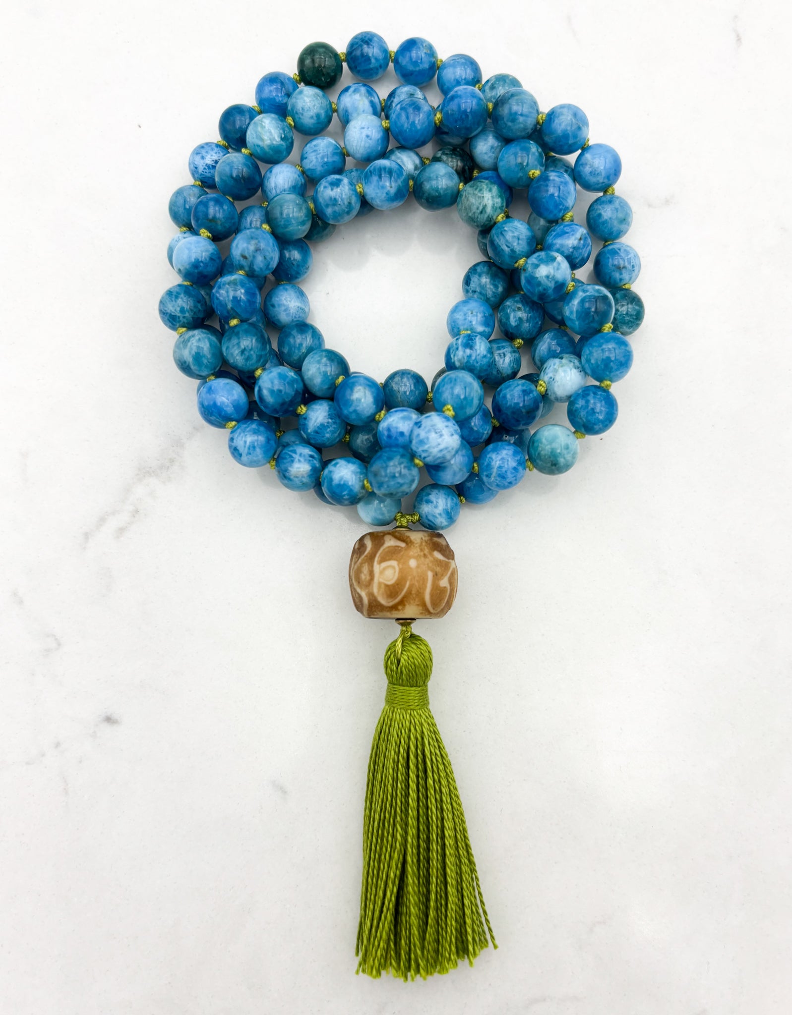 Blue Apatite gemstone mala with carved bone guru bead and green tassel | radiant malas | handmade in boulder, colorado