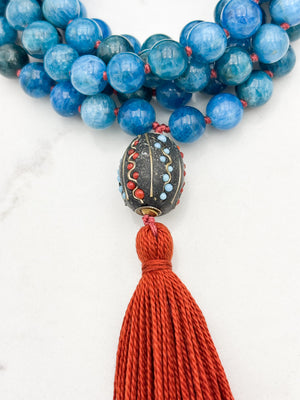 blue apatite gemstone mala necklace with Tibetan guru bead and rust tassel | radiant malas | handmade in boulder, colorado