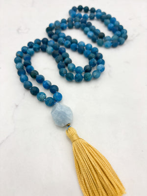 blue apatite gemstone mala with aquamarine guru bead and yellow tassel | radiant malas | handmade in boulder, colorado