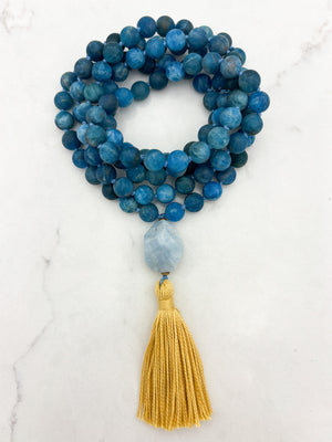 blue apatite gemstone mala with aquamarine guru bead and yellow tassel | radiant malas | handmade in boulder, colorado