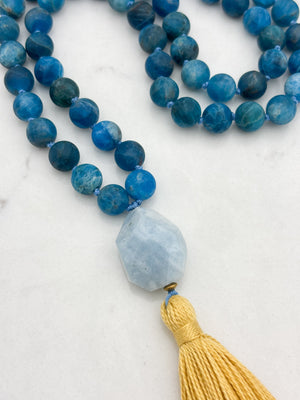 blue apatite gemstone mala with aquamarine guru bead and yellow tassel | radiant malas | handmade in boulder, colorado