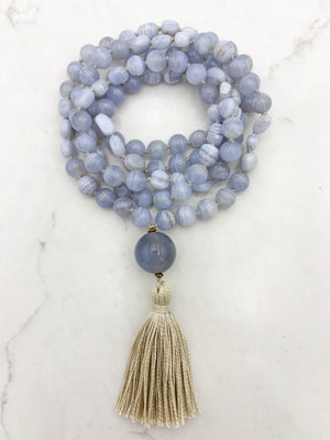 blue chalcedony gemstone mala with chalcedony guru bead and cream colored tassel | radiant malas | handmade in boulder, colorado