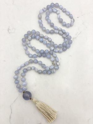 blue chalcedony gemstone mala with chalcedony guru bead and cream colored tassel | radiant malas | handmade in boulder, colorado