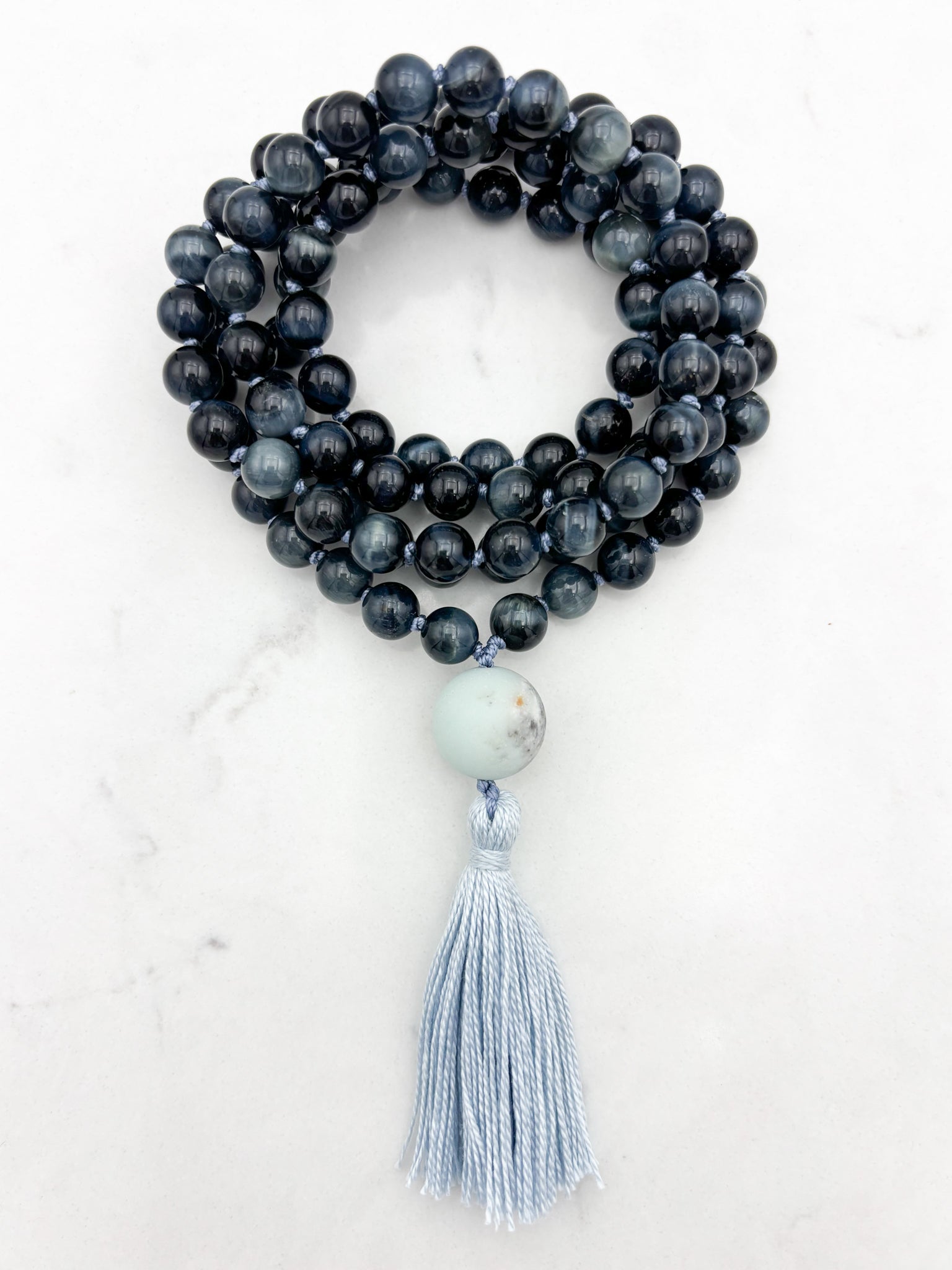blue tiger's eye gemstone mala with amazonite guru bead and light gray tassel | radiant malas | handmade in boulder, colorado