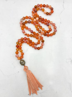 Red Botswana Agate Gemstone Mala with brass guru bead and peach silk tassel | radiant malas | handmade in Boulder, colorado