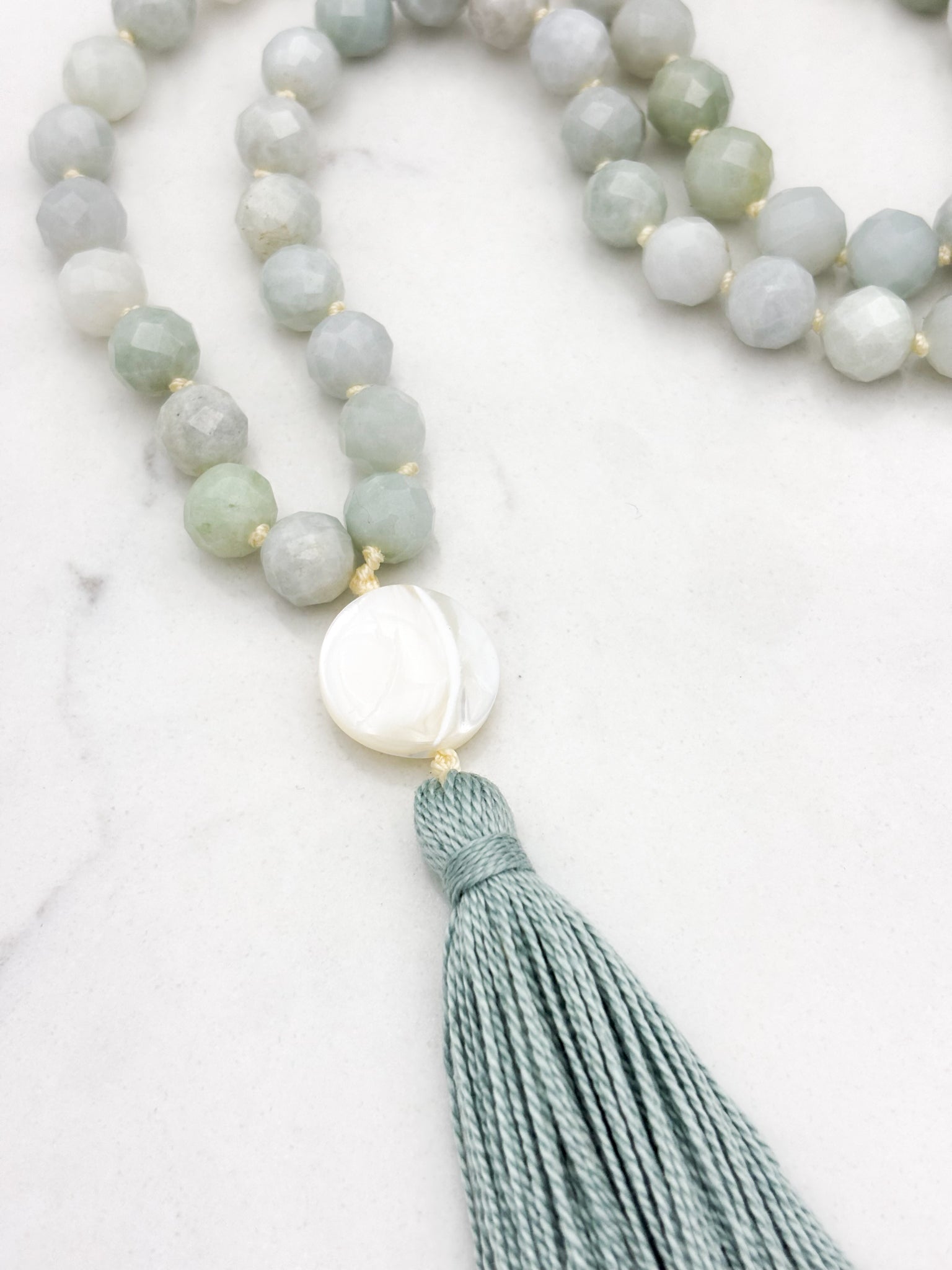 burma jade gemstone mala with mother of pearl guru bead and mint green tassel | radiant malas | handmade in boulder, colorado
