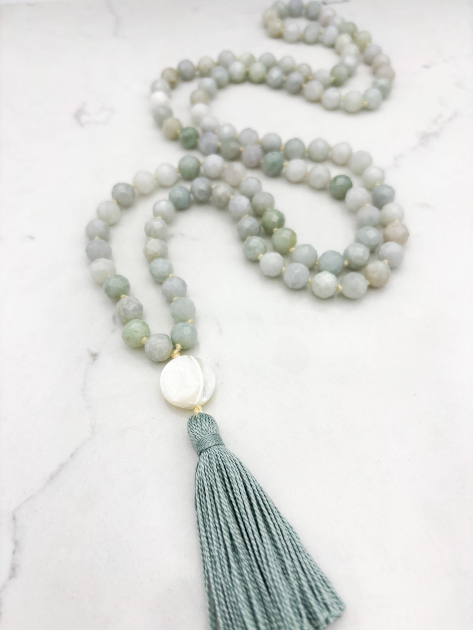 burma jade gemstone mala with mother of pearl guru bead and mint green tassel | radiant malas | handmade in boulder, colorado