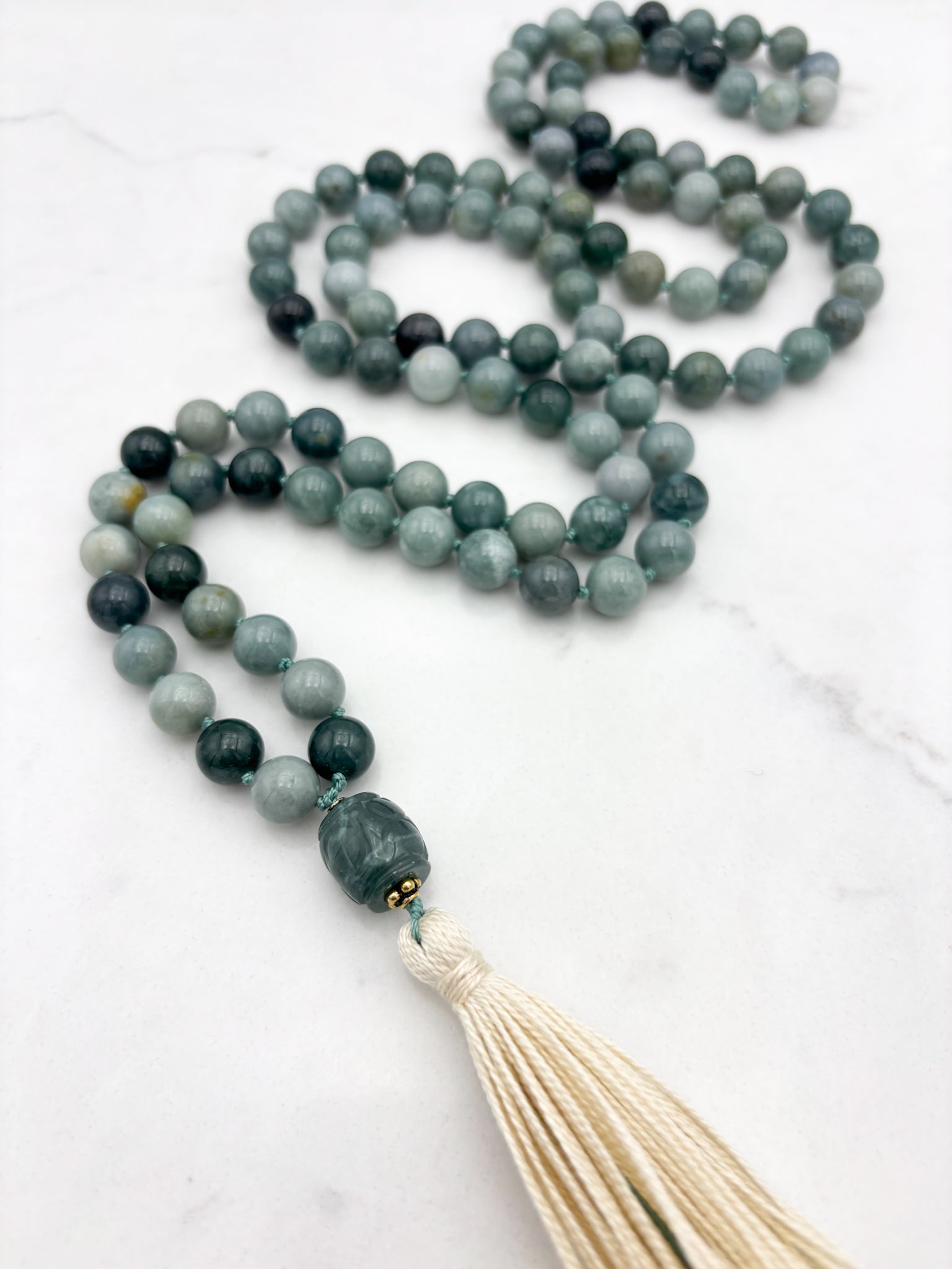 burma jade gemstone mala with burma jade guru bead and cream tassel | radiant malas | handmade in boulder, colorado