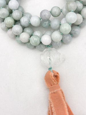 burma jade gemstone mala with clear quartz lotus guru bead and peach silk tassel | radiant malas | handmade in boulder, colorado
