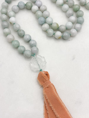 burma jade gemstone mala with clear quartz lotus guru bead and peach silk tassel | radiant malas | handmade in boulder, colorado