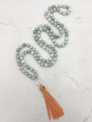 burma jade gemstone mala with clear quartz lotus guru bead and peach silk tassel | radiant malas | handmade in boulder, colorado